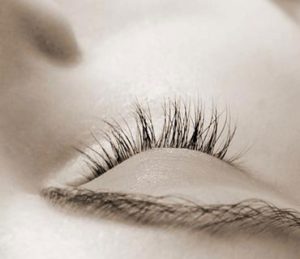Close-up of a woman's face as she relaxes with no apparent anxiety.