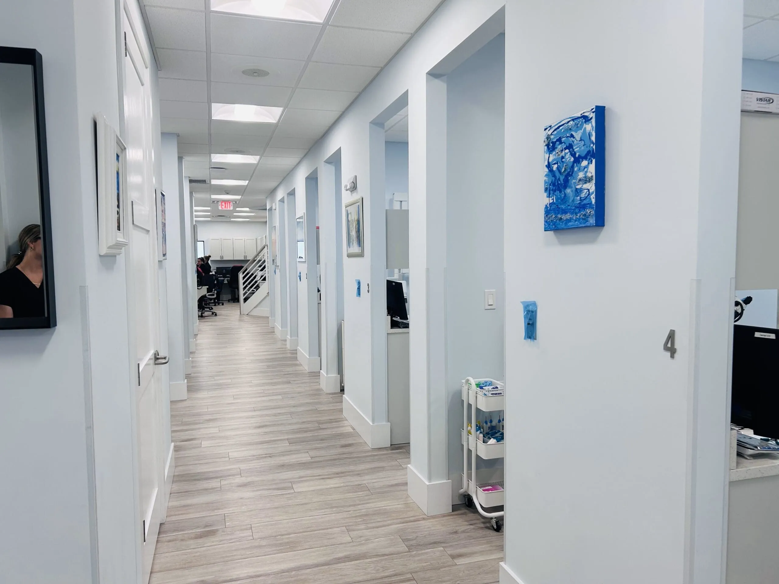 Hallway leading down into different rooms and operatories in Cameron Dental Studio